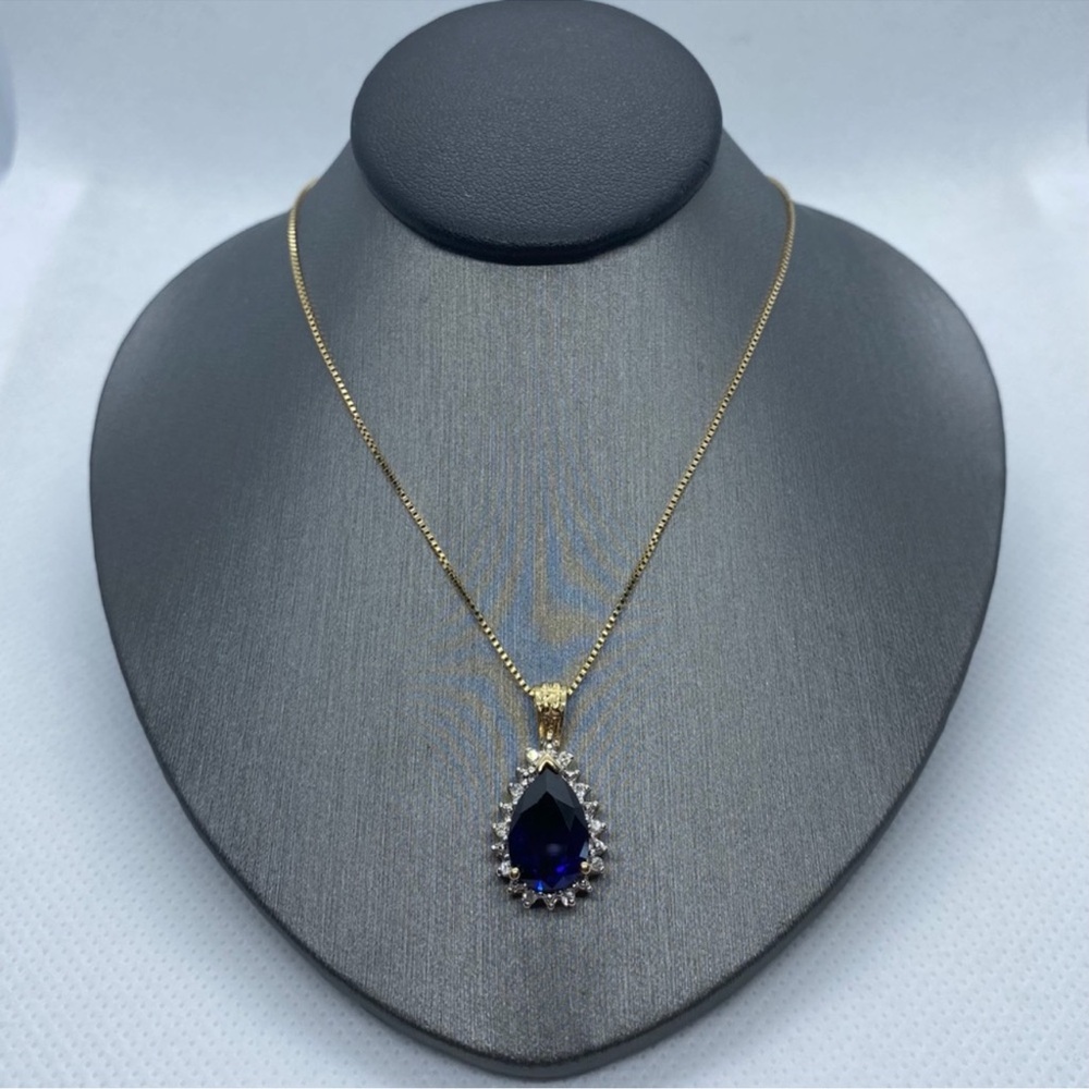 10kt yellow gold, diamond and blue sapphire necklace